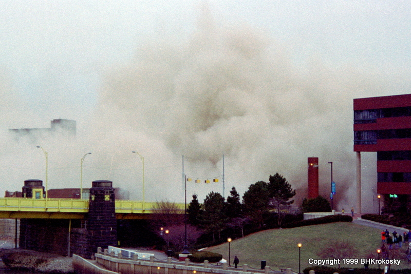 Cloud of debris begins to clear after the demolition of Three Rivers Plaza.